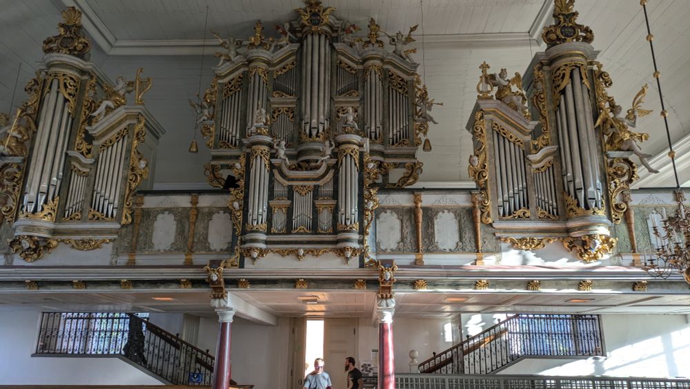 Large north German organ, 1500 pipes, in white painted sunny church