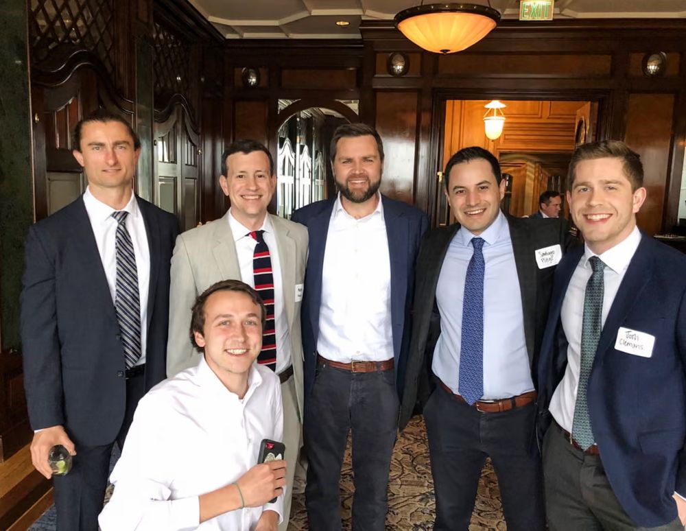 A bunch of guys hanging with JD Vance. They all have jerkfaces, but the jerkfaces are not identical