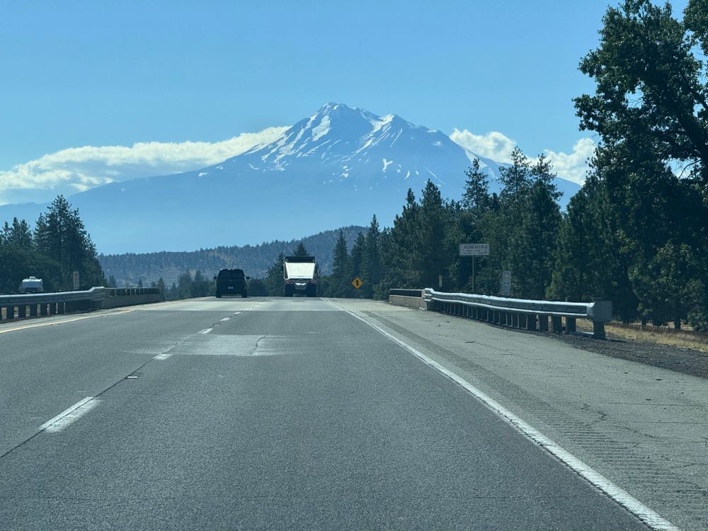 Highway and mountains, with occasional flat tires.