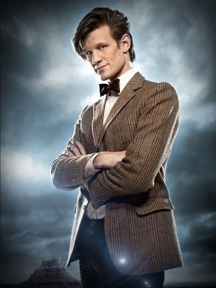 Doctor Who standing backlit in front of a stormy sky