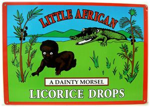 An brightly-colored ad for "Little African" brand licorice drops pictures a frightened & naked black infant crawling away from a ravenous-looking alligator, and labels the baby "a dainty morsel".