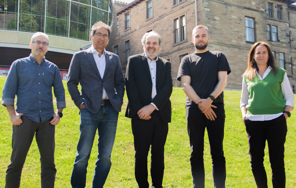 The team behind Lasting Asset standing in front of the Craiglockhart campus building.