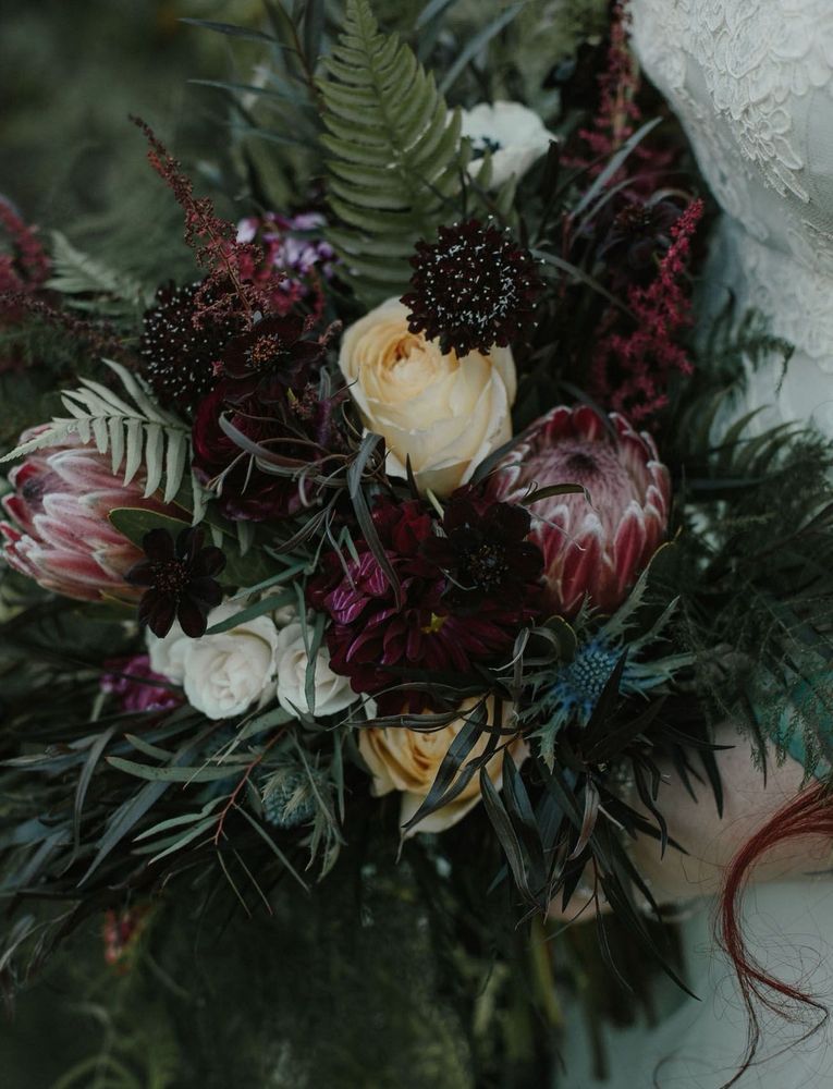 red, gold, and black flowers