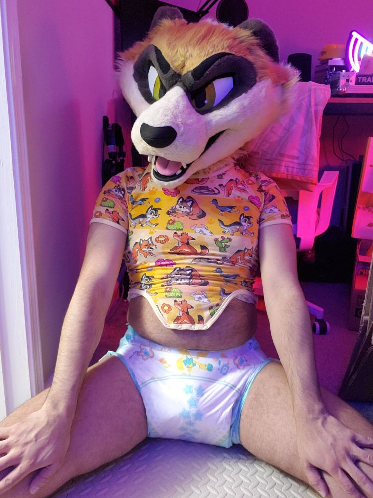 Diaper is all secure, the lil ferret is looking proud of their work 