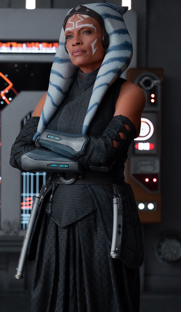Rosario Dawson as Ahsoka posing with her arms crossed. 