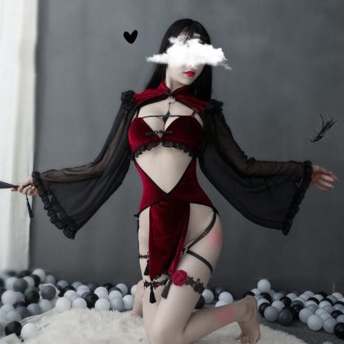 DDLG Midnight Witch Lingerie. It features a segmented red velvet center, sheer, flowing black sleeves, and a black garted adorned with a rose.