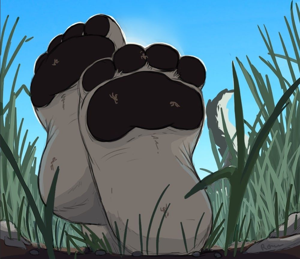 A pair of massive white paws resting on top of each other in between the short grass of a forest. Glued to the paws are the bodies of some random stepped micros.