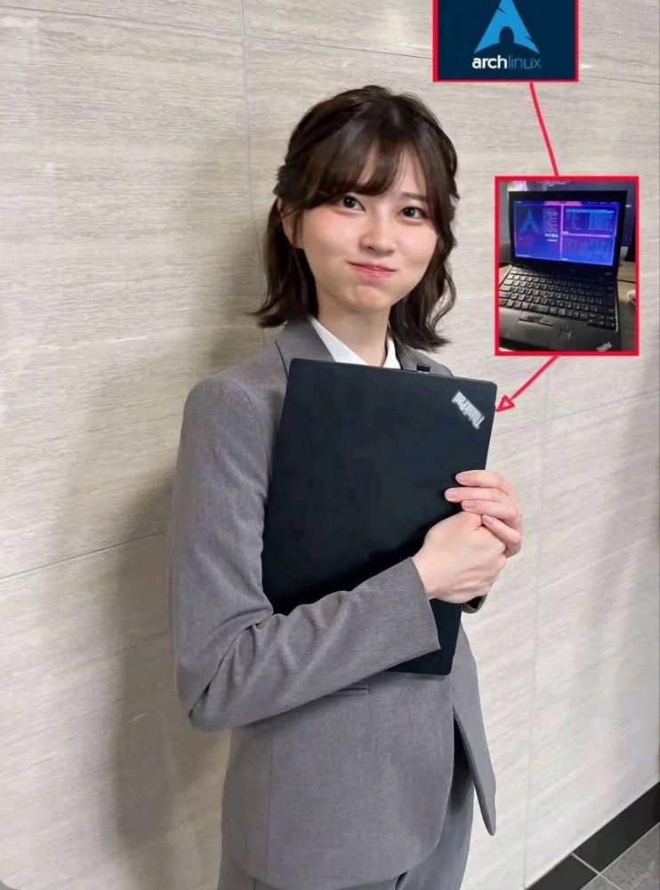Woman in a suit holding a Thinkpad (laptop). The Thinkpad is annotated with images showing it running Arch Linux with a tiling window manager.