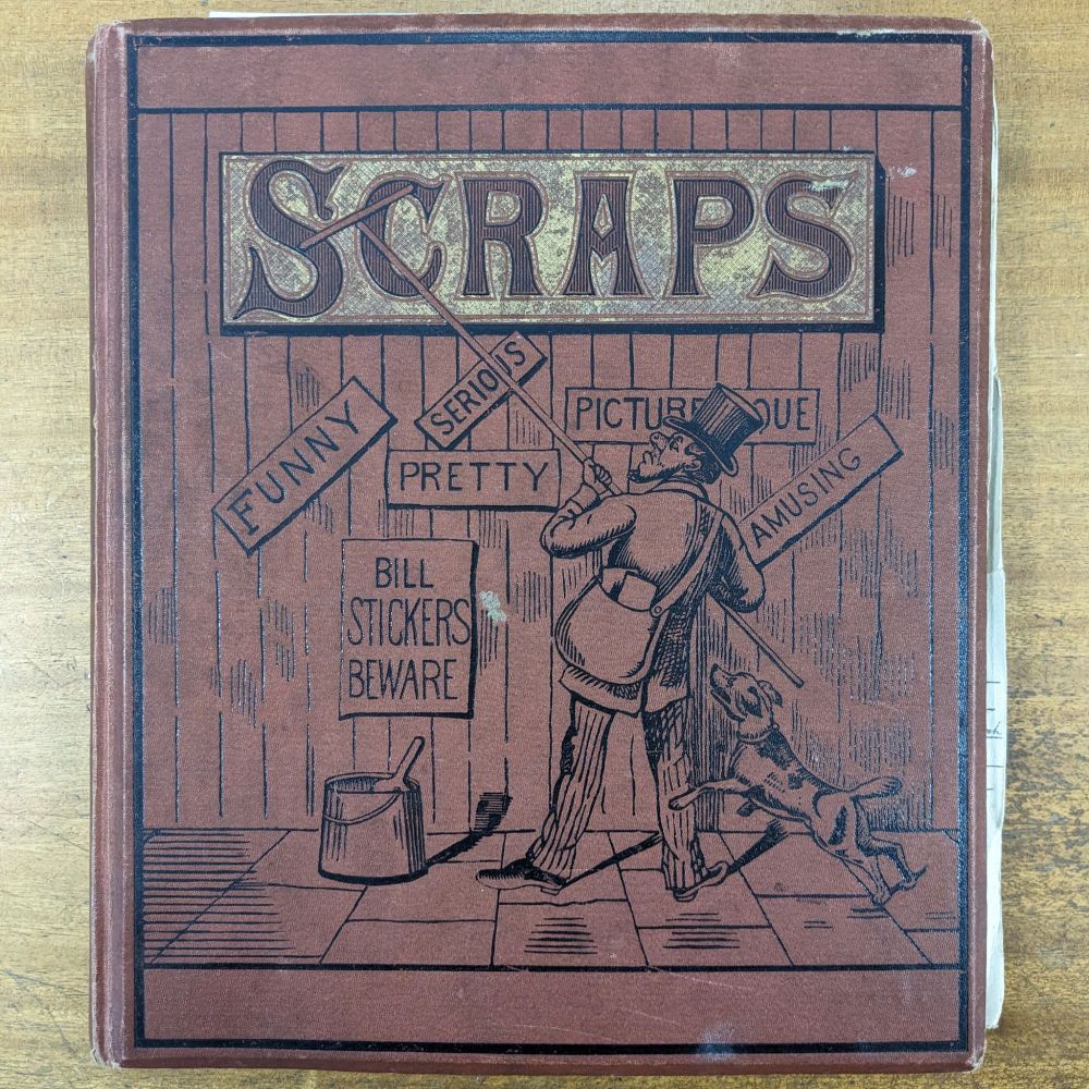 The front cover of Walter Keep's scrapbook, showing a man pasting up the word 'scraps' over a fence.
