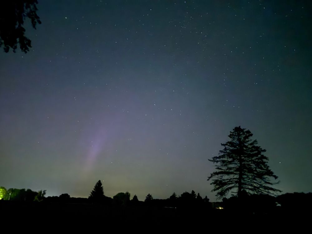 View over the Cornell golf course at night , looking North, showing one faint band of nitrogen plasma 