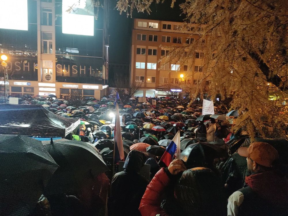 November 17. 2025 people in Poprad, Slovakia commemorating the velvet revolution and protesting the government of Robert Fico.
Hundreds of umbrellas glistening with rain.