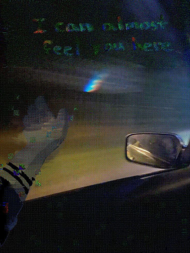 paw reaching out car window to feel the air on a night drive glitched effect makes paw/arm look translucent and artifacted it says I can almost feel you here 