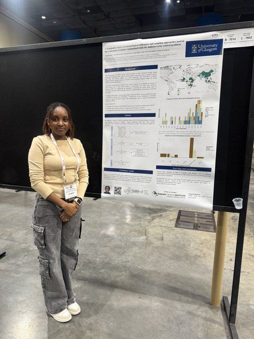 Victoria Githu,  Researcher at the Ifakara Health Institute and PhD student at the University of Glasgow, stands by her poster at the ASTMH 2024 conference 