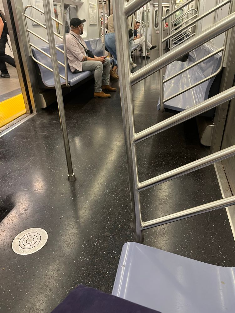 A subway car where the doors on either side do not line up with each other 
