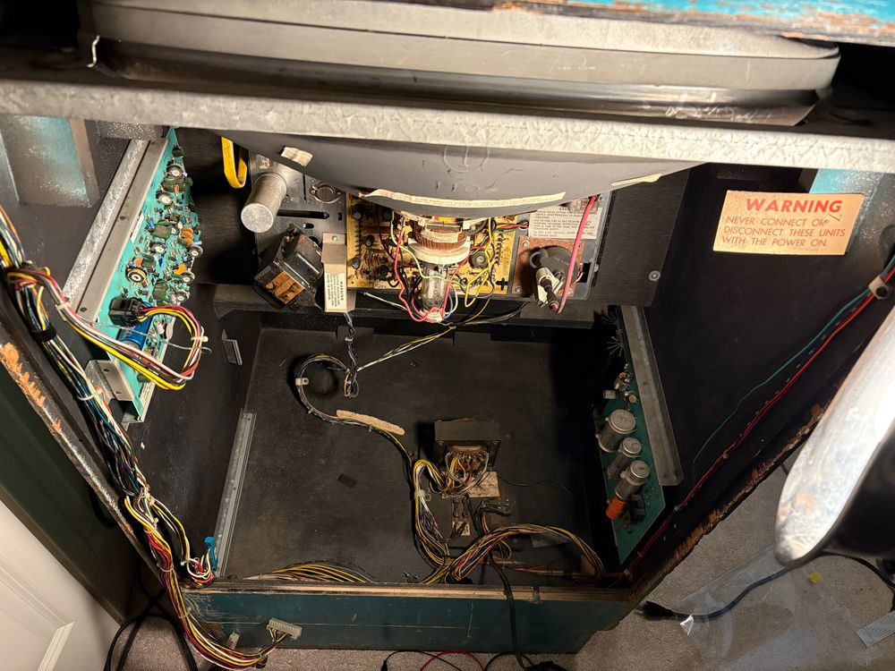Picture of the inside of the Sea Wolf arcade cabinet with game board missing