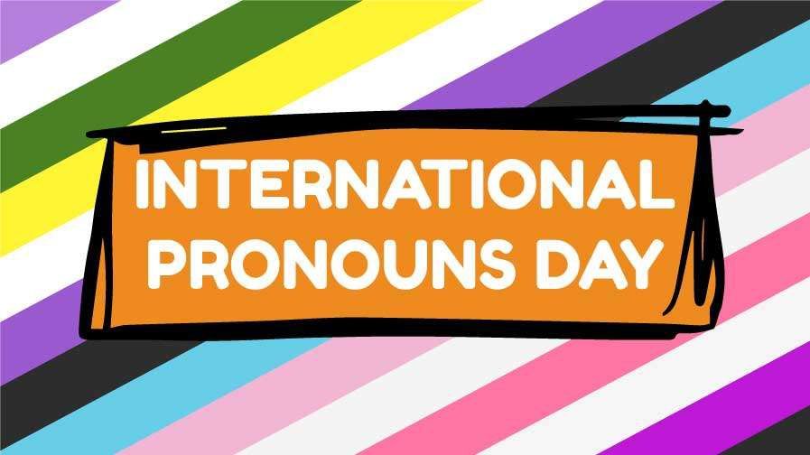 Orange banner with white text says International Pronouns Day. The background is diagonal stripes in the colors of the genderqueer, nonbinary, trans, and genderfluid flags.