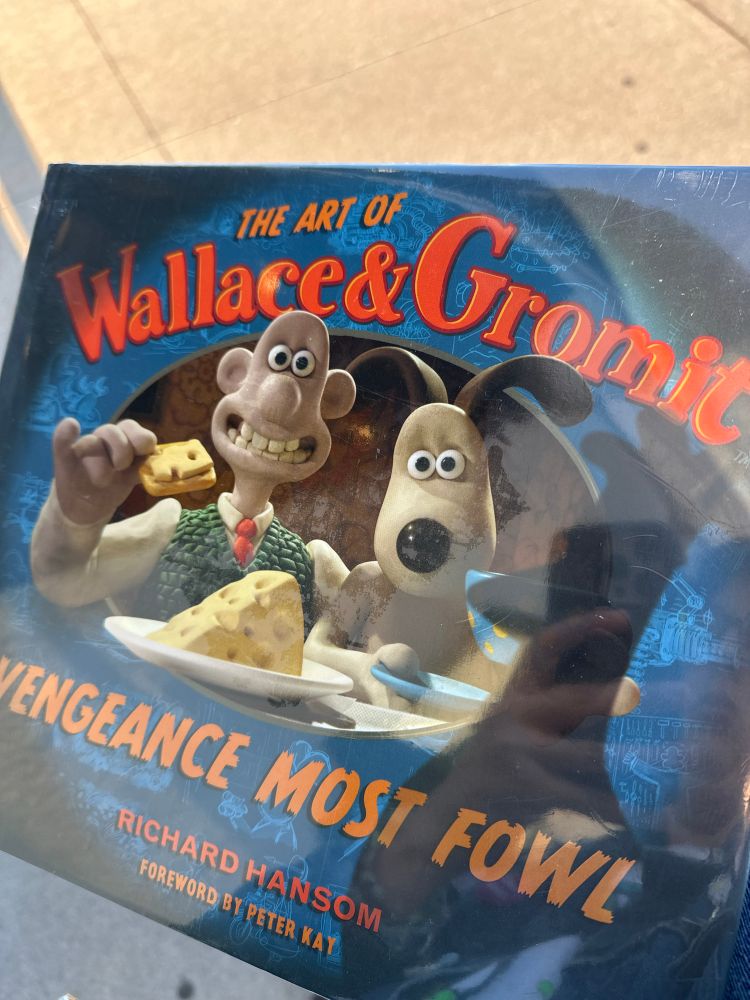 book featuring the art of wallace and gromit: vengeance most fowl 