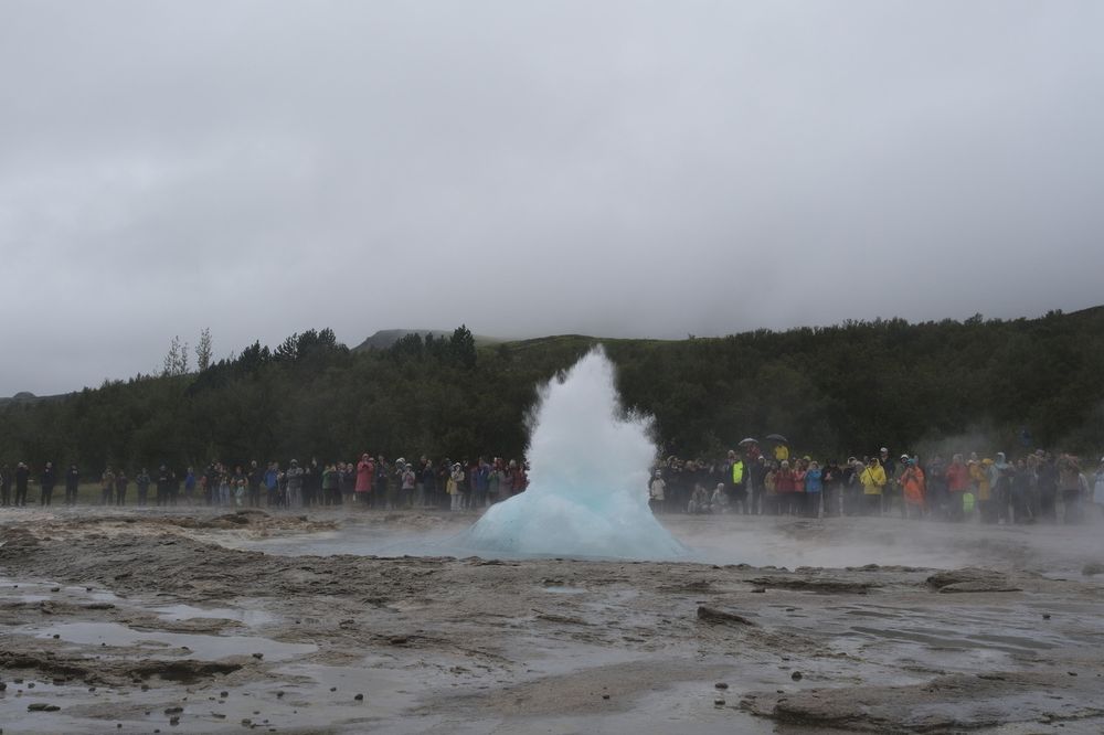 Strokkur geyser erupts. 