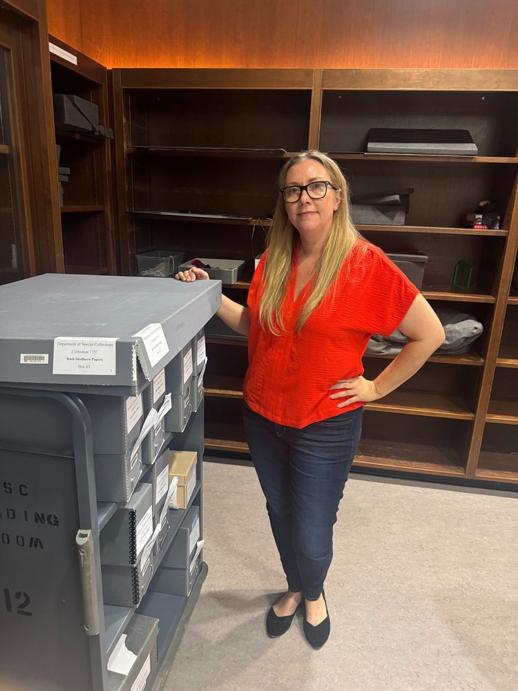 Julie Benson at UCLA Research Library with Ruth Shellhorn's blueprints, diaries, and ephemera. 