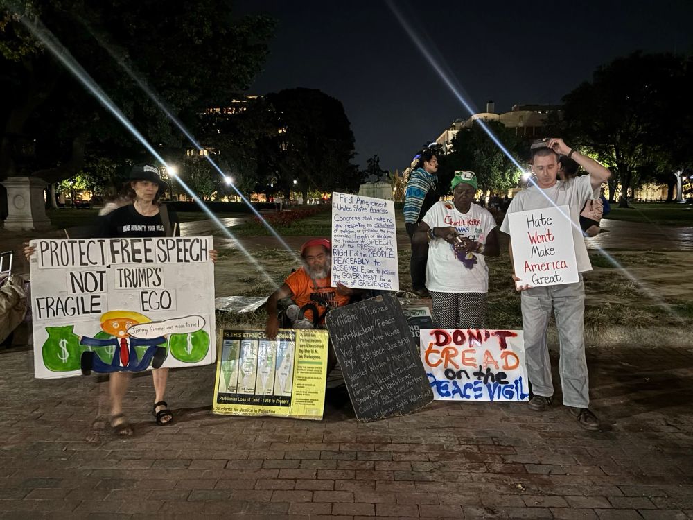 Peace Vigil update: Park Police reopened Lafayette Park and several of the peace activists returned carrying signs—and stood outside the White House—everything was gone—except their will to remain. They stayed until about 10:30 pm. 