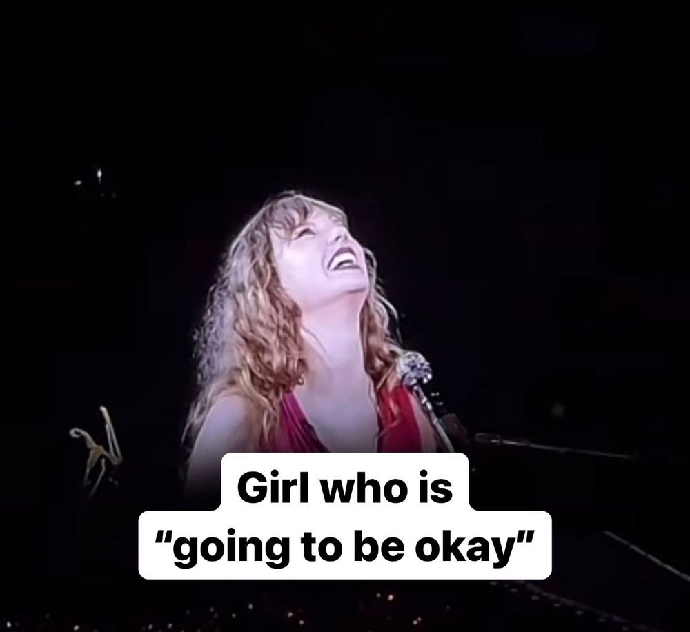 Taylor Swift throwing her head back and laughing in Eras Tour with text over her that reads: Girl who is "going to be okay"