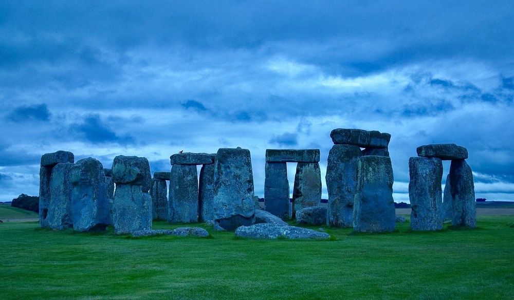 Stonehenge: several rectangular, upright stone blocks stood in a circle.