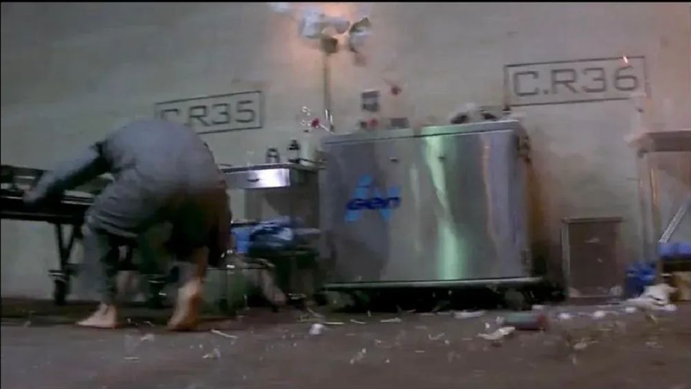 An InGen-branded medical cabinet in the midst of a hi-octane prison escape scene from the movie Face/Off.