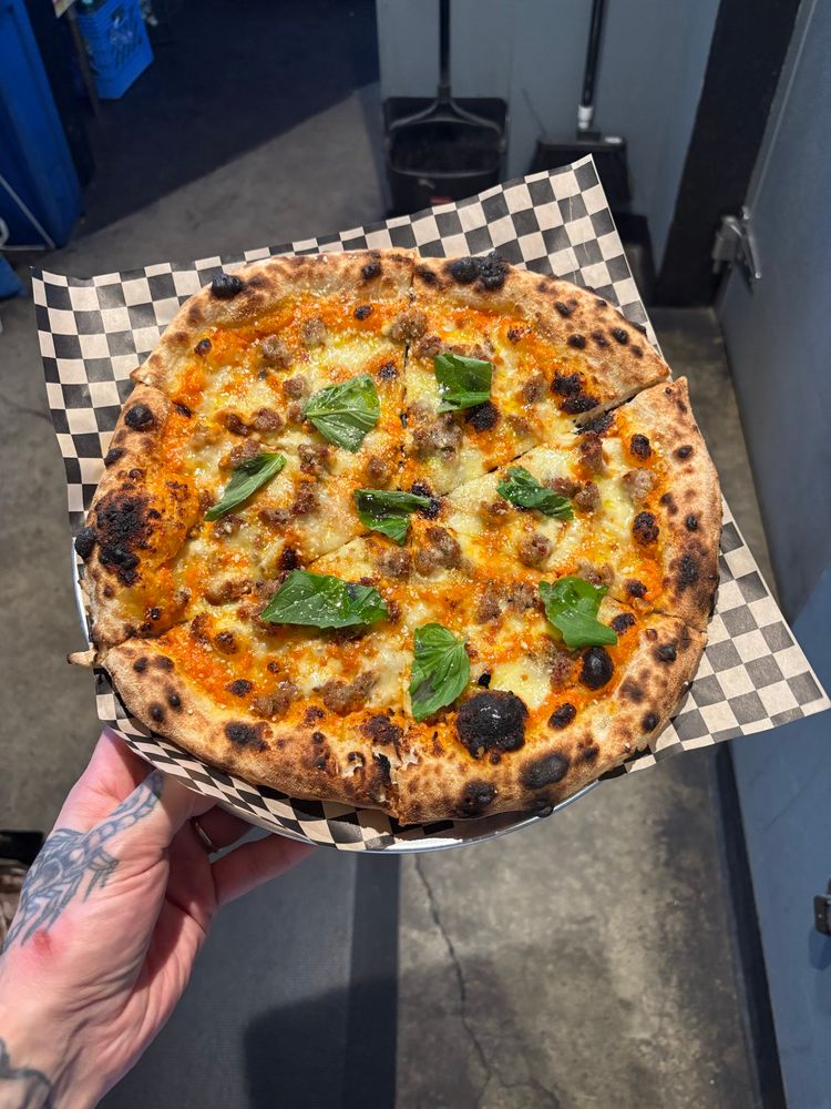 Vodka pie with Italian sausage and smoked scamorza cheese 