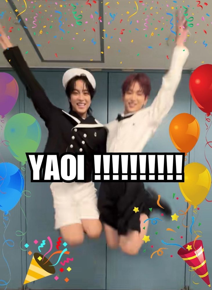 taki e harua do grupo &team no ar após pular enquanto estão sorridentes e com as mãos para o alto. de fundo tem balões adicionados digitalmente e na frente deles está escrito YAOI !!!!!!!!!!