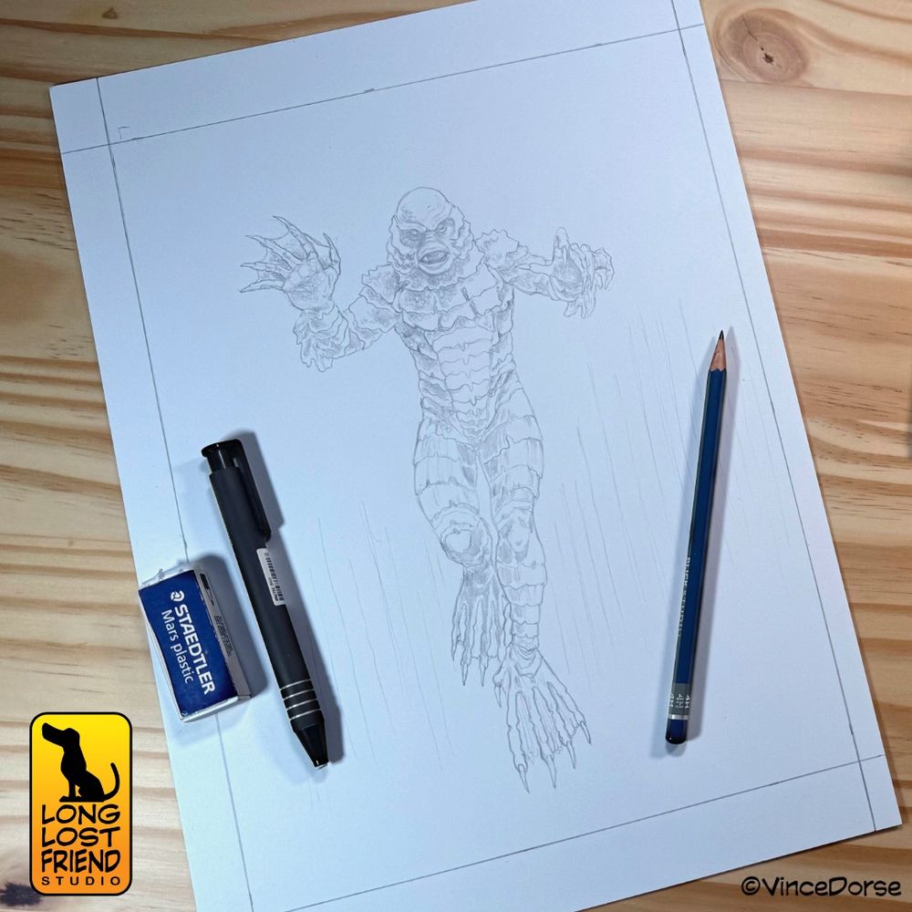 pencil sketch of the Creature from the Black Lagoon. A pencil and erasers sit on the paper, framing the Creature.