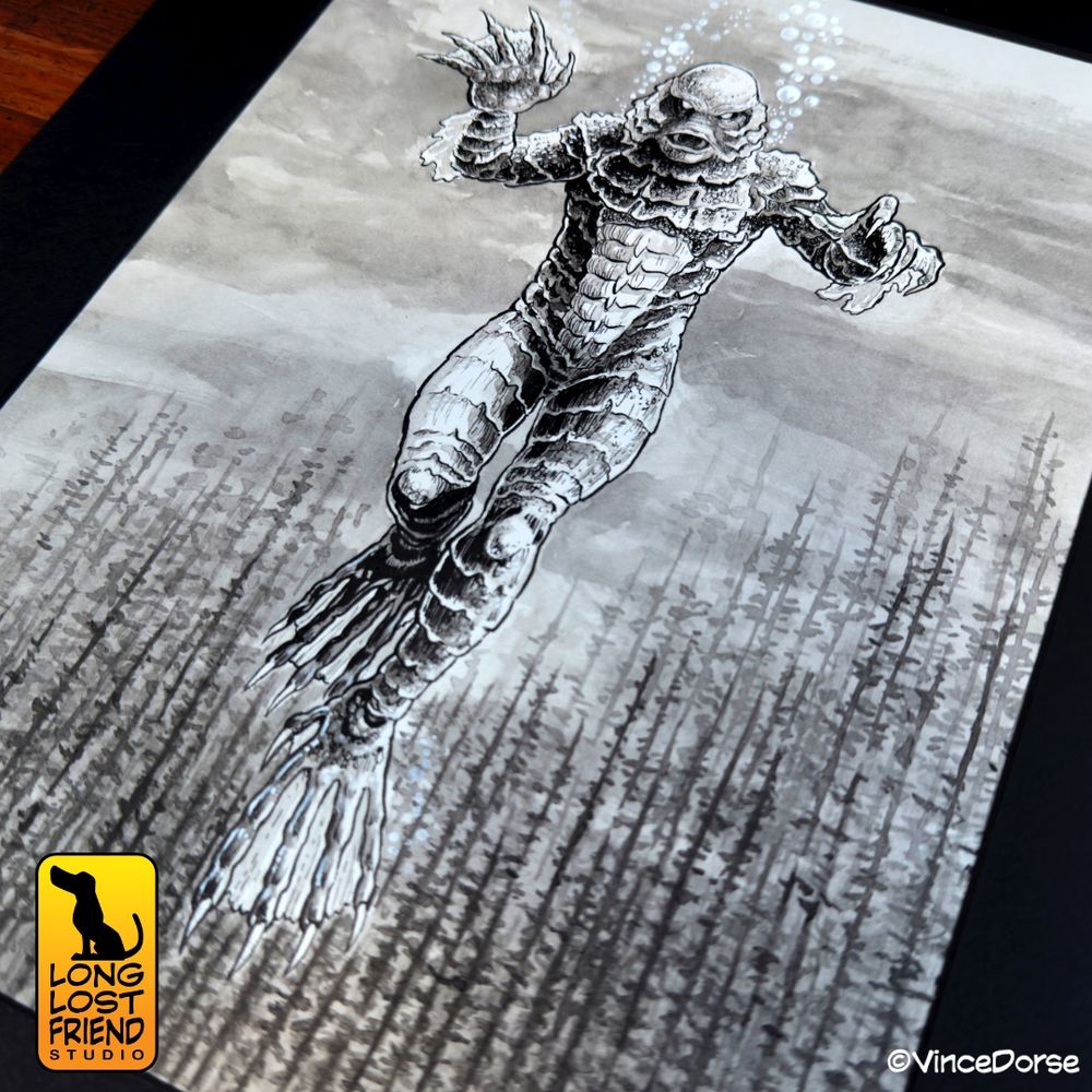 Finished Creature from the Black Lagoon ink illustration depicts the monster floating menacingly in the murky water, bubbles emanating from the gills on his head. Around him, leafy pondweeds grow vertically from the bottom of the lagoon. 
