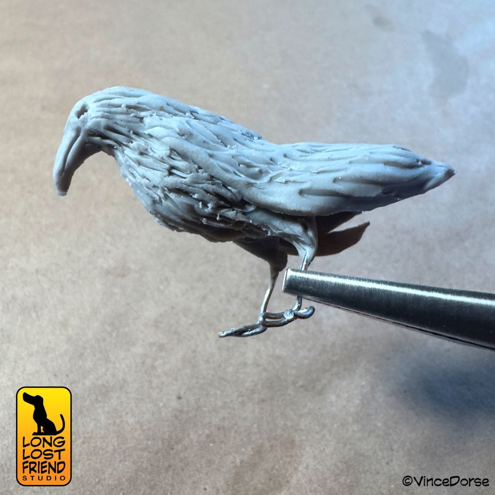 Work in progress polymer clay of a bird.