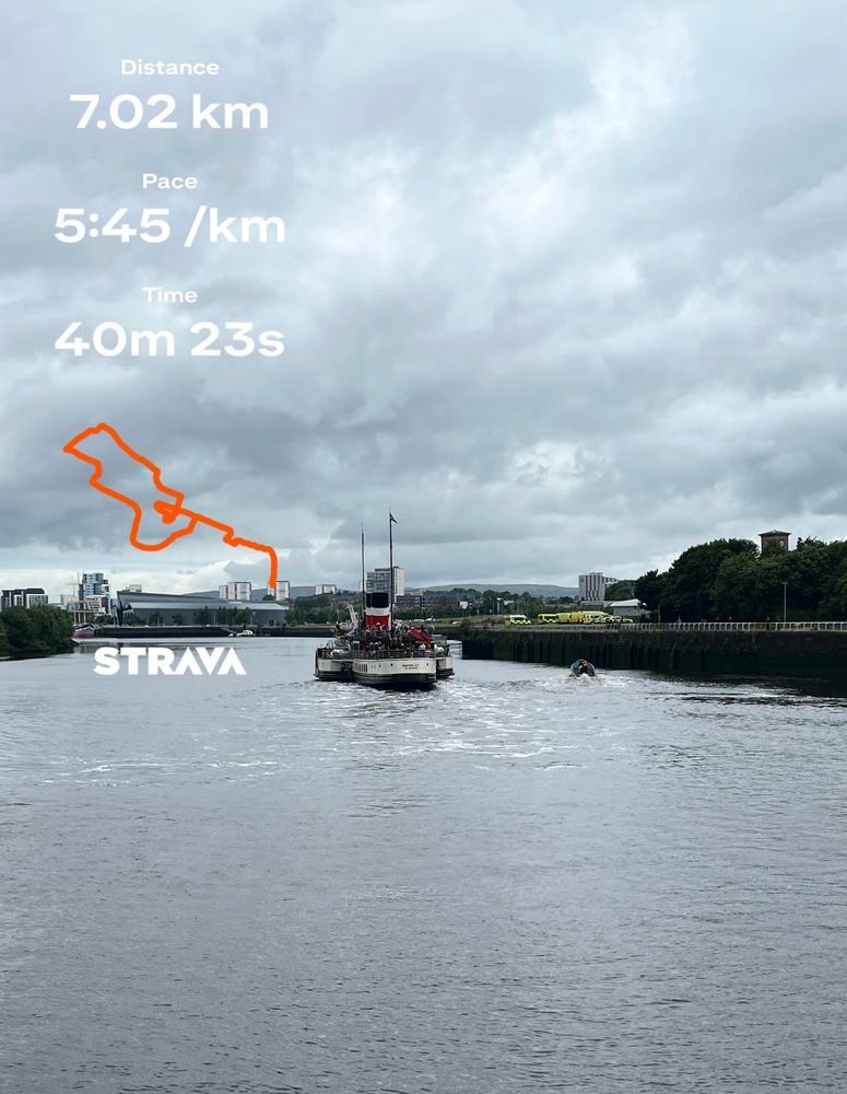 A shot down the River Clyde, looking west towards the Riverside Museum and Tall Ship Glenlee. The paddle steamer Waverley is making her way along the river towards the sea. Strava stats show a 7km run done in 40m 23s