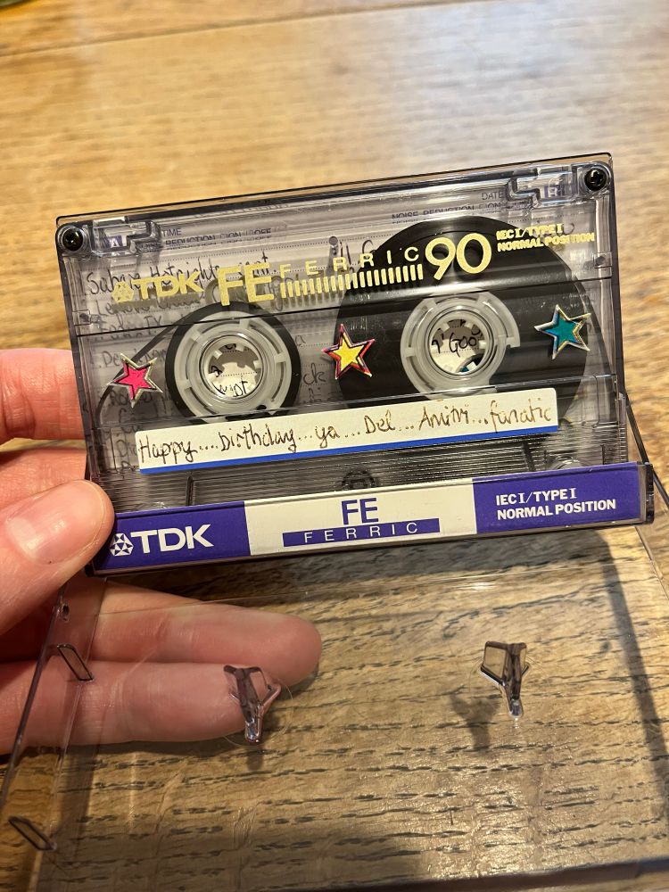 The blank tape, on which this amazing playlist has been recorded. For reasons that are absolutely lost to the mists of time, the sticker along the bottom says “happy…birthday…ya…Del…Amitri…fanatic”. 