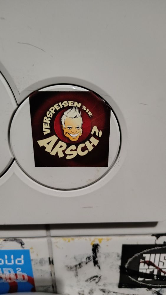 quadratischer aufkleber im stil von "Verstehen Sie Spaß?" mit dem comic gesicht von guido cantz, aber der text sagt "verspeisen Sie Arsch?"