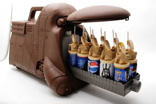Star wars droid troop transport cooler. Soda cans can be stored inside the transport with battle droids on top of it.