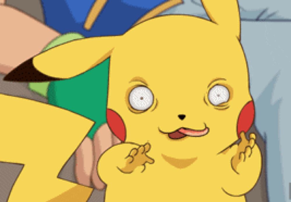 a close up of a pikachu with white eyes sticking out its tongue