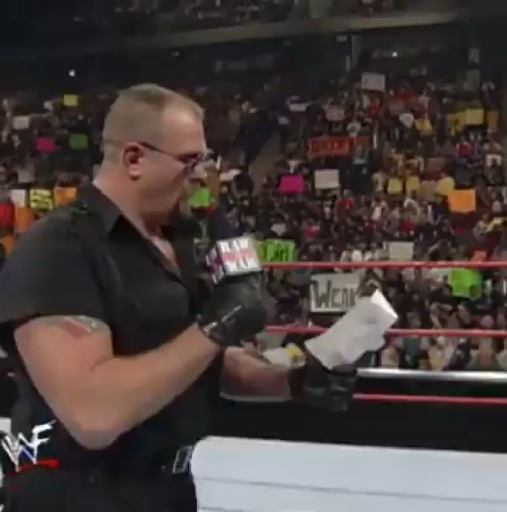 WWF's Big Bossman reads a poem in the ring