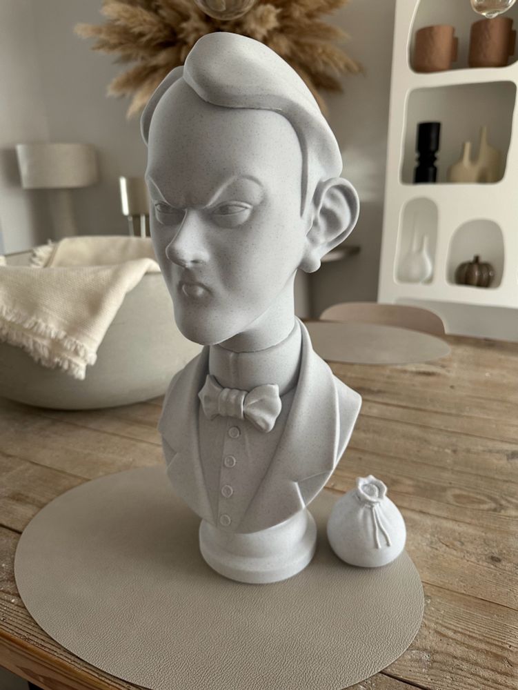 3D printed bust of Wellington, one of the Twins from Disney World’s Haunted Mansion. Printed in marble colored PLA filament.