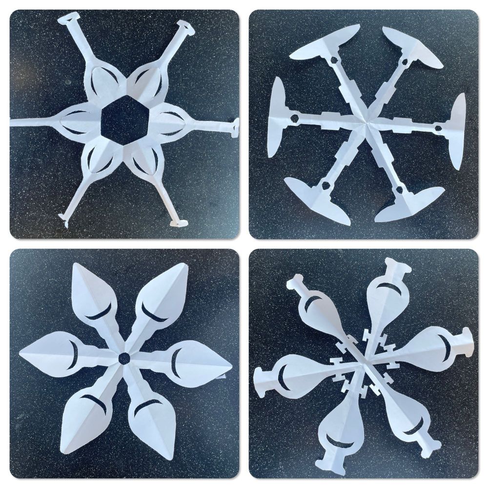Paper snowflakes based on laboratory equipment - volumetric flasks, Bunsen burners, pear-shaped flasks and separating funnels