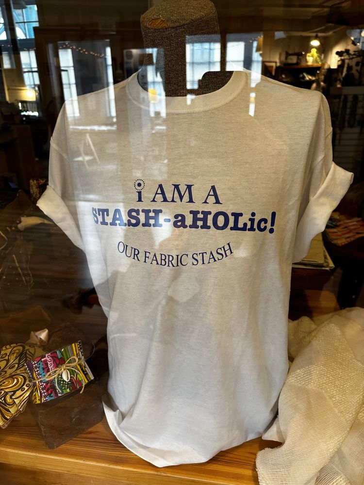 T-shirt that says “I’m a stash-a-Holic”