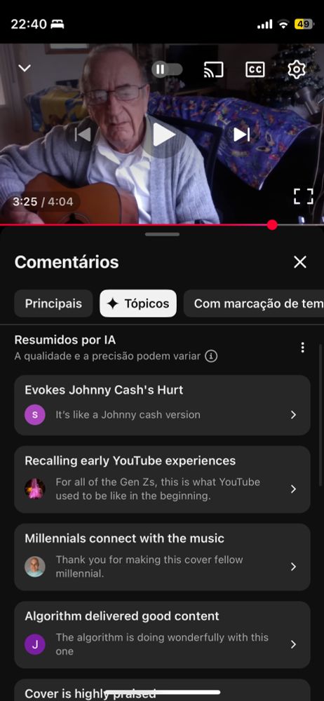 Screenshot do YouTube de um vídeo de um velhinho tocando Blink 182 I miss you no violão e a áreas de comentários agregada por IA