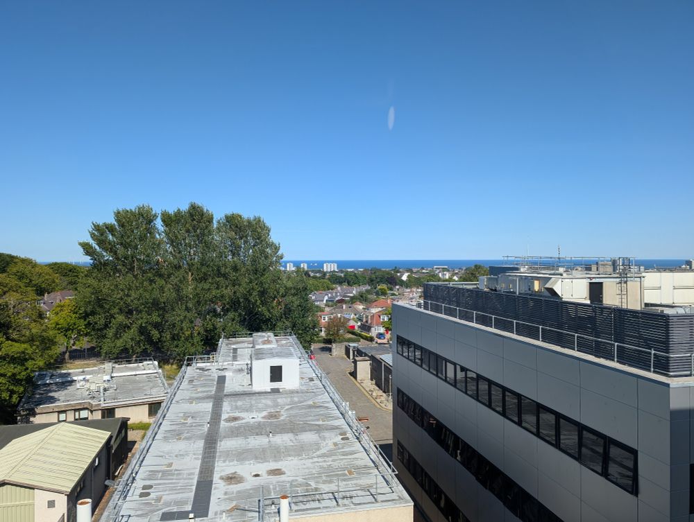 View down to the sea in Aberdeen with blue sky