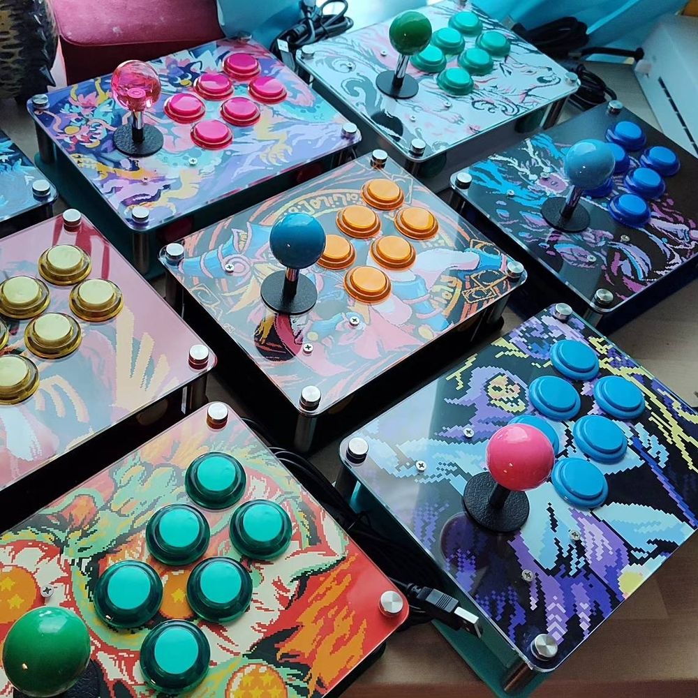 a random assortment of my arcade sticks laid out