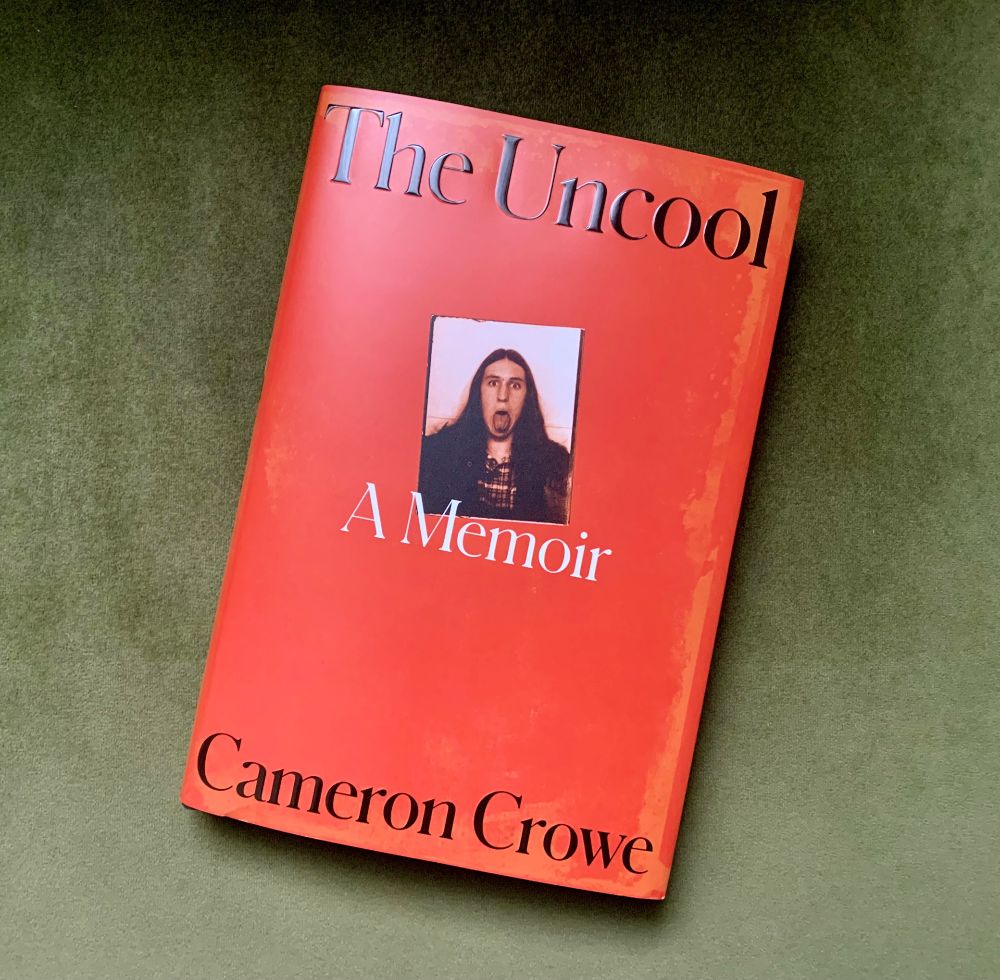 the cover of Cameron Crowe's memoir, titled The Uncool, featuring a photo of a young man with long hair making a silly face