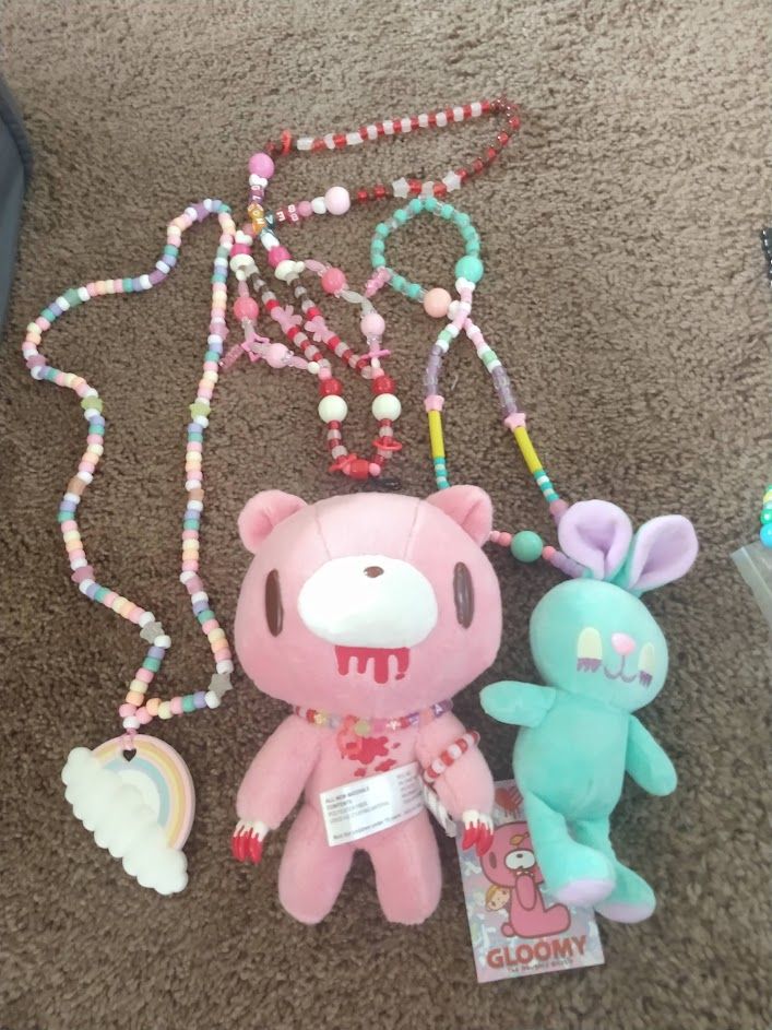 pastel rainbow chewelry necklace, gloomy bear pink and red necklace, and pastel blue bunny necklace