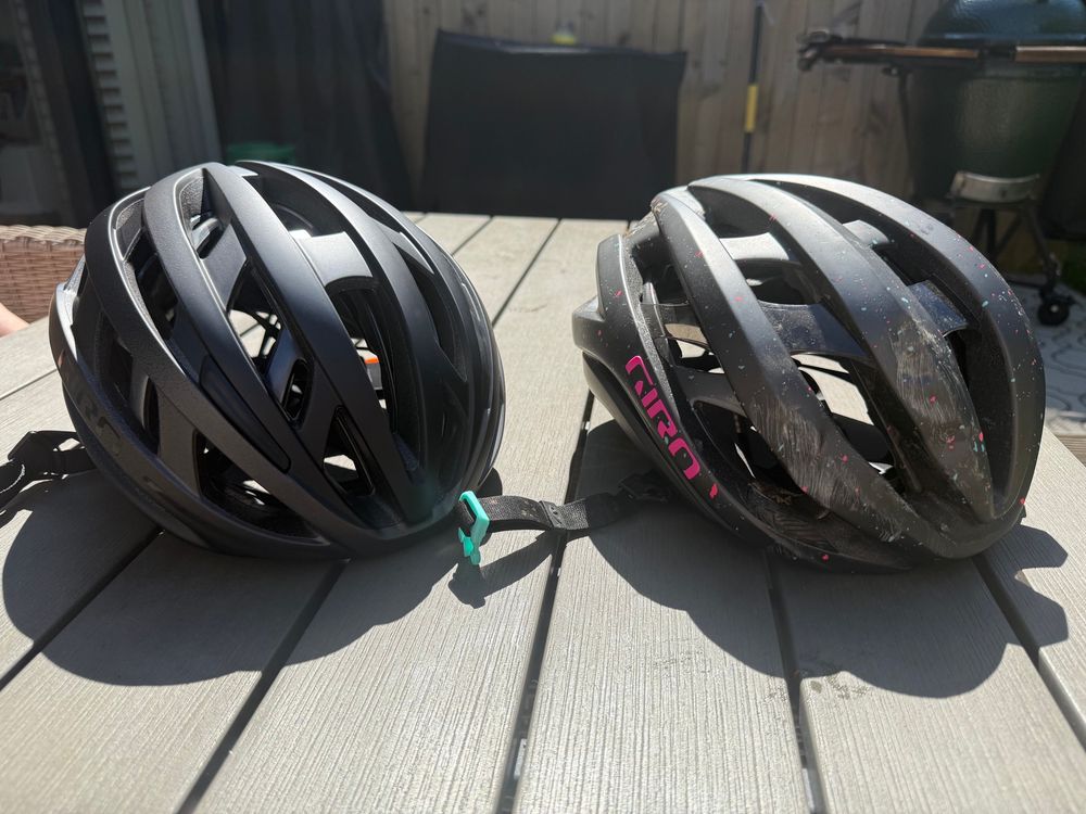 New helmet, next to my old helmet with destroyed internals after a crash