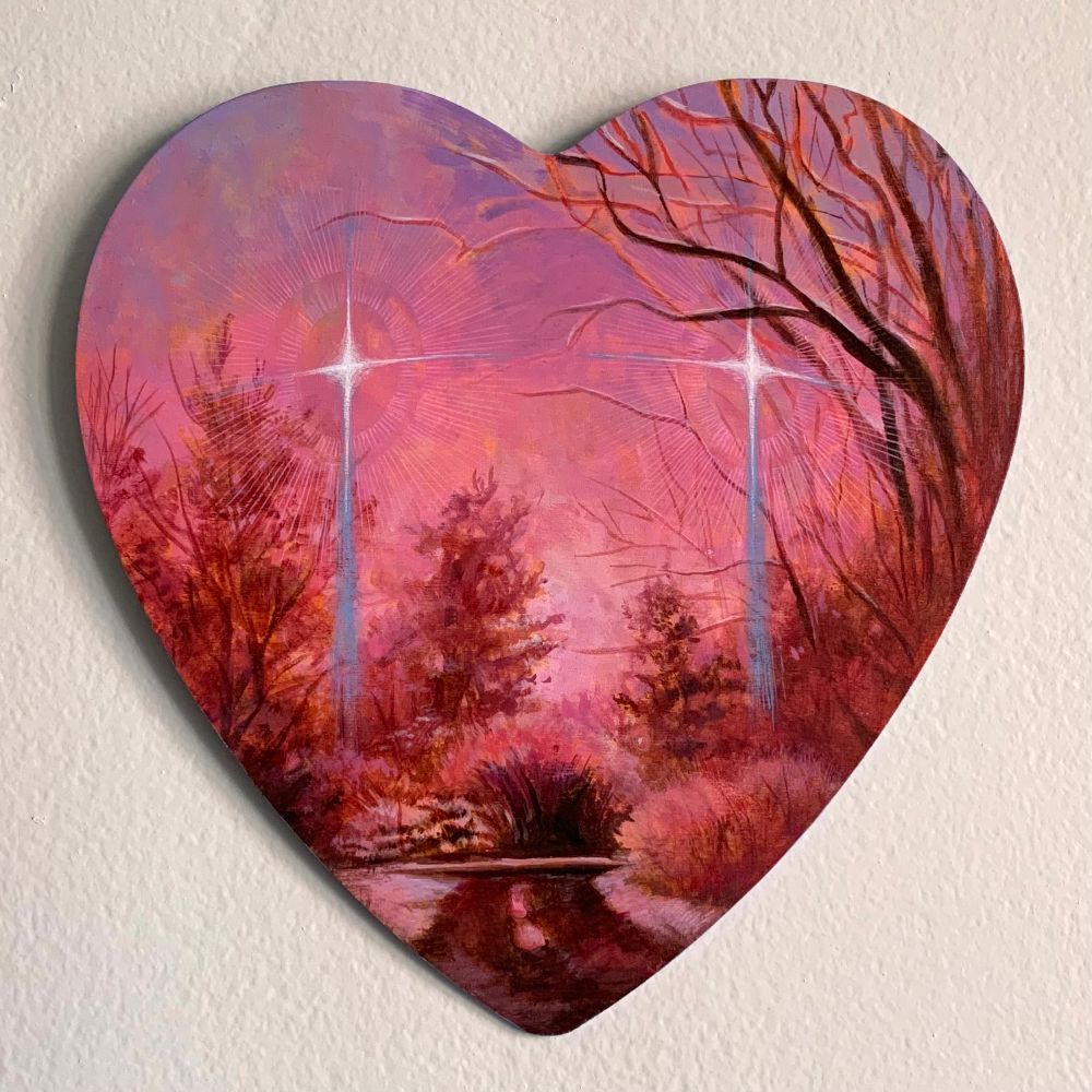 A heart shaped painting on a white background. The painting depicts a pink winter scene of a rocky road framed by trees. floating in the sky are too blue-tailed stars with soft pink halos