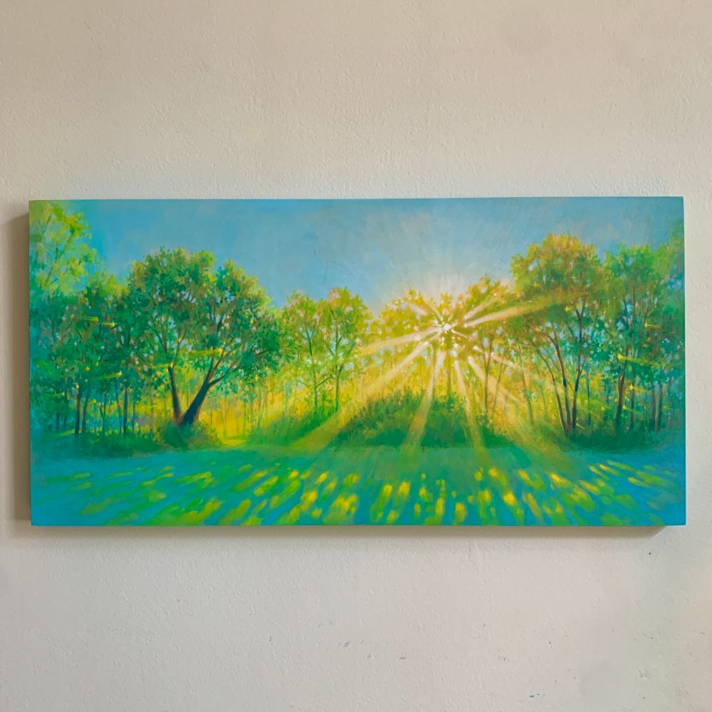 A panoramic landscape painting against a white background. the painting depicts a green and blue lawn, the white and yellow sun pierces through the tree line behind, casting a pattern of dappled light onto the grass