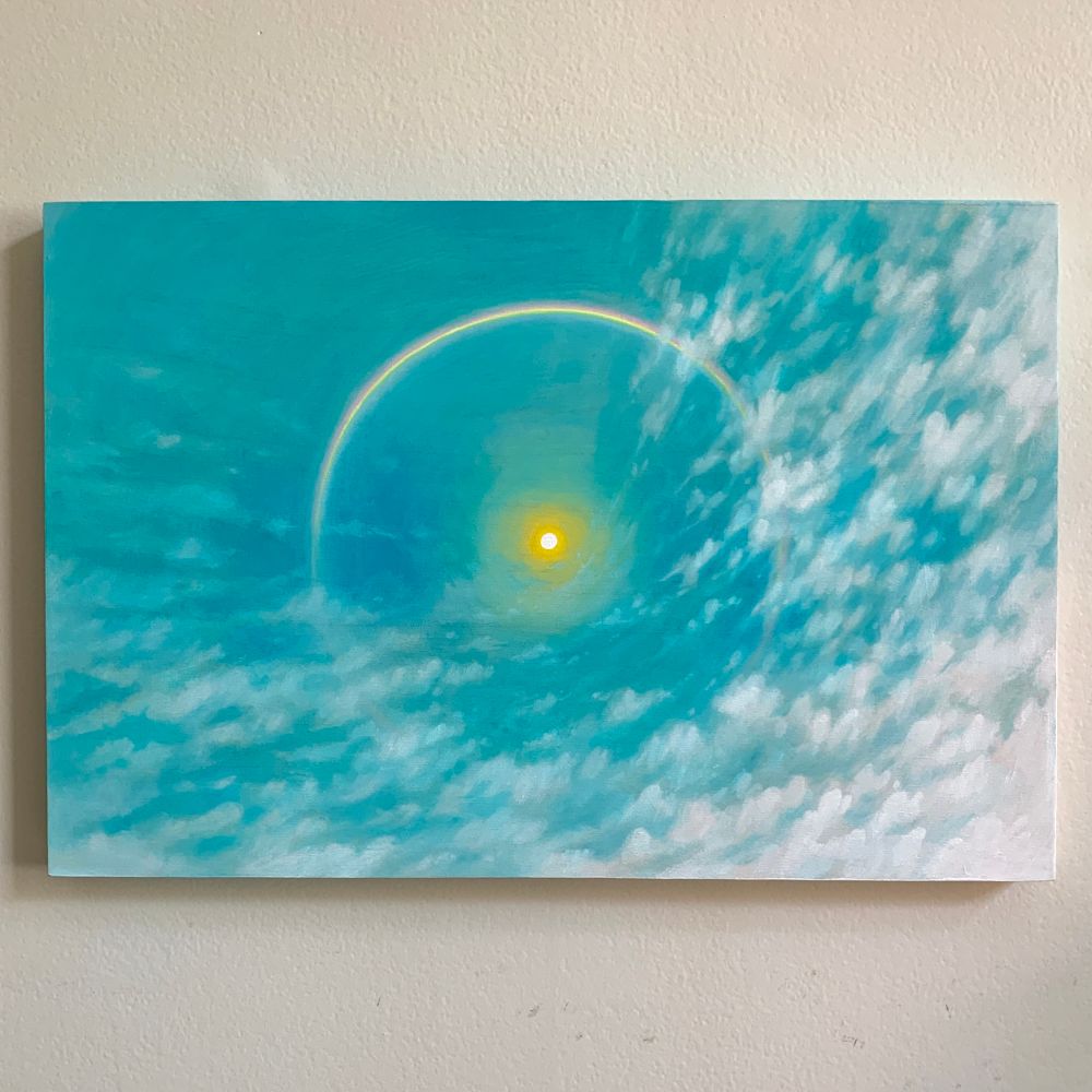 A rectangular painting against a white background. The painting depicts a blue sky with warping white clouds and a sun in the center. Surrounding the sun is a circular rainbow that fades into the clouds.
